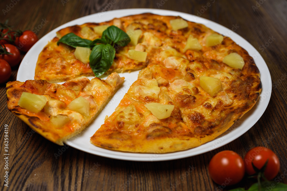 pizza with meat and tomatoes under cheese
pizza with meat and tomatoes under cheese