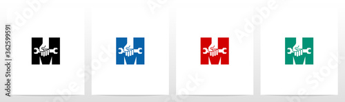 Hand Holding Wrench On Letter Logo Design M