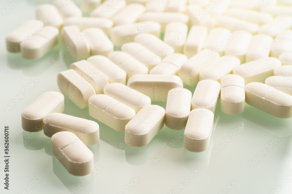 Medicine tablets or pills or medications drugs on table, close up. Medicine tablets or pills or medications drugs on table, close up.