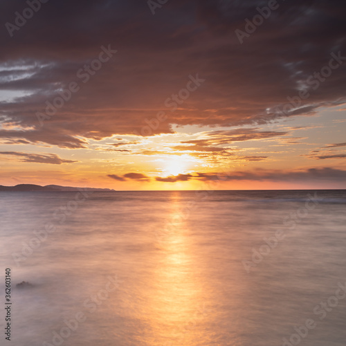 Fototapeta Naklejka Na Ścianę i Meble -  Sunset on the beach in Corsica