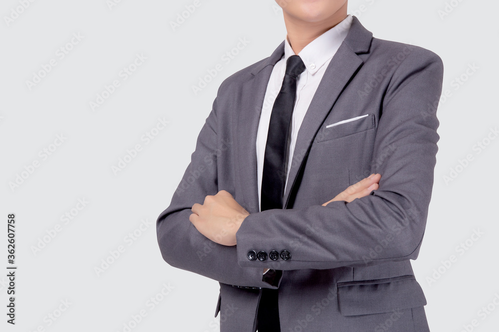 Closeup portrait businessman in suit with crossed his arms standing isolated on white background, young asian business man is manager or executive having confident is positive with success. Closeup portrait businessman in suit with crossed his arms standing isolated on white background, young asian business man is manager or executive having confident is positive with success.