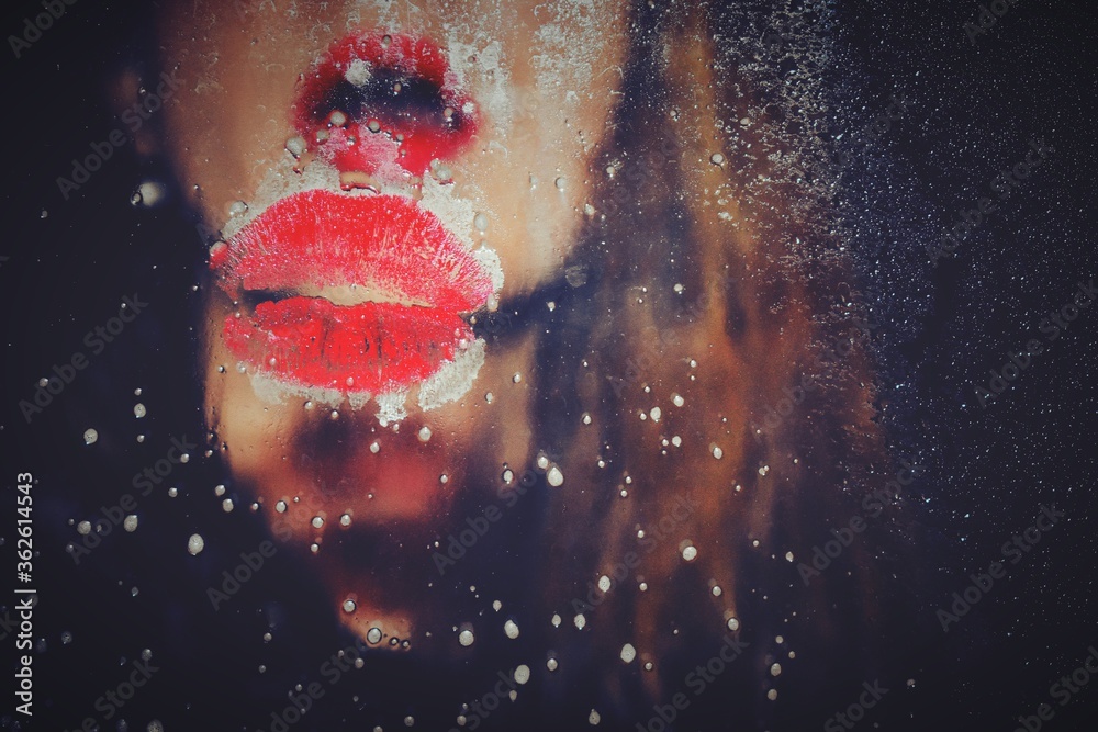 Woman With Lipstick Kiss Mark On Glass Window Stock Photo | Adobe Stock