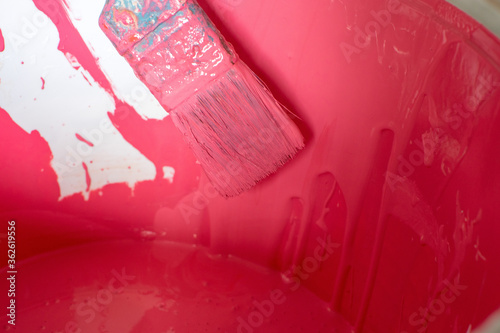 close-up of a brush in pink, painting