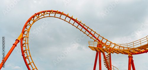 Fototapeta Naklejka Na Ścianę i Meble -  Roller coaster in the amusement park. 
