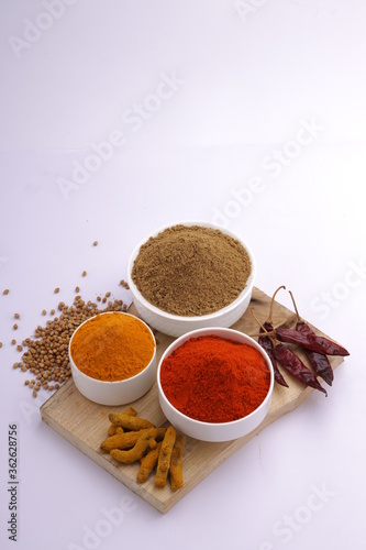 Indian spices_turmeric,chilli and coriander photo