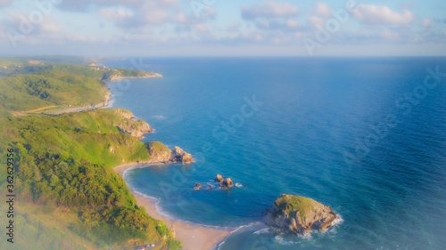 aerial shot over clouds on the sea.