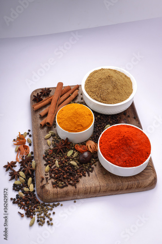 Fototapeta Naklejka Na Ścianę i Meble -  Spices with wooden background