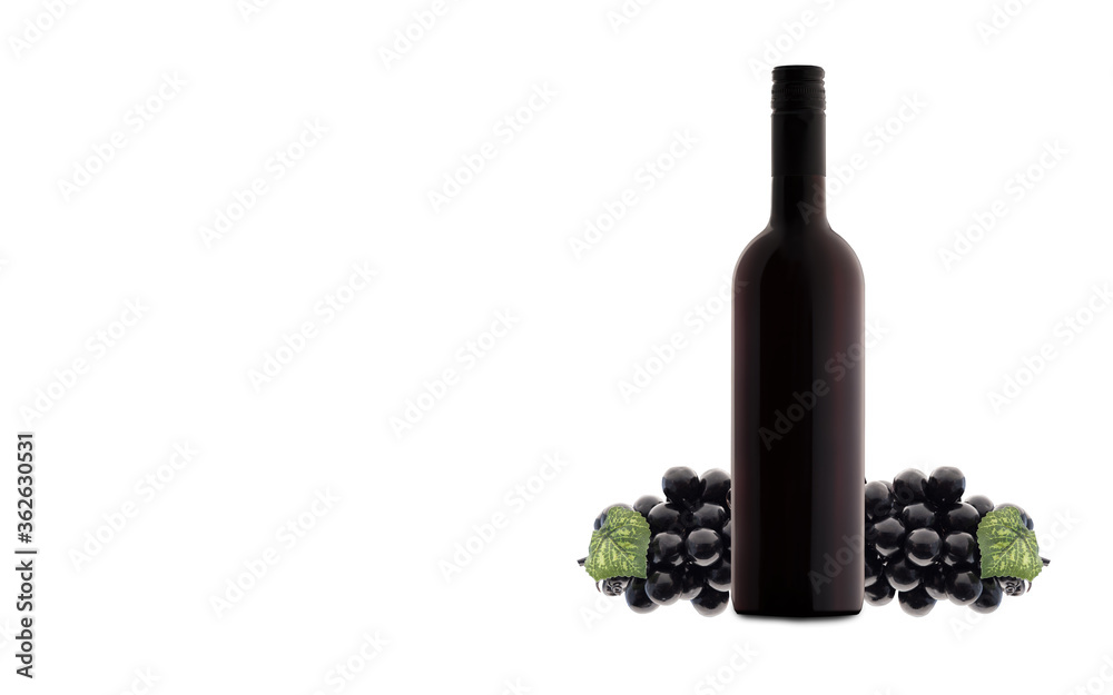 Bottle of wine and bunch of grapes with copy space.