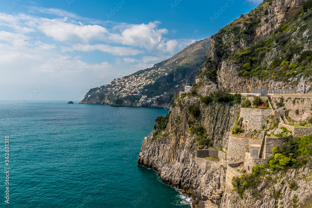 A view along the cliffed coastline at Marina di Praia, Praiano, Italy looking towards Positano