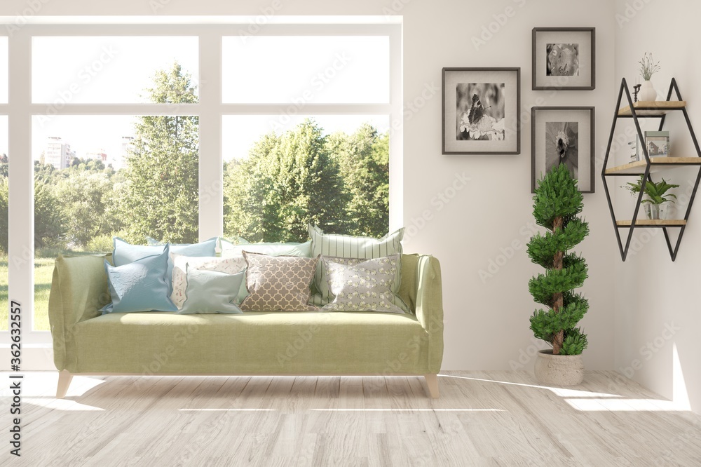 Fototapeta premium White living room with sofa and summer landscape in window. Scandinavian interior design. 3D illustration
