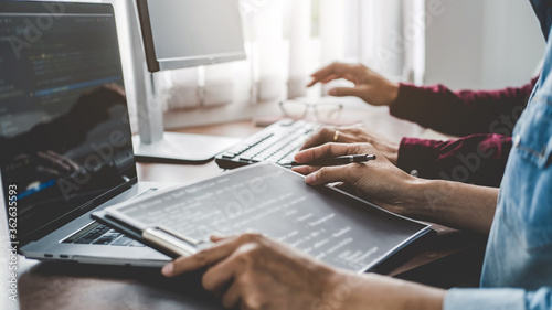 Wallpaper Mural Programmer working in a software development and coding technologies. Website design. Technology concept. Torontodigital.ca