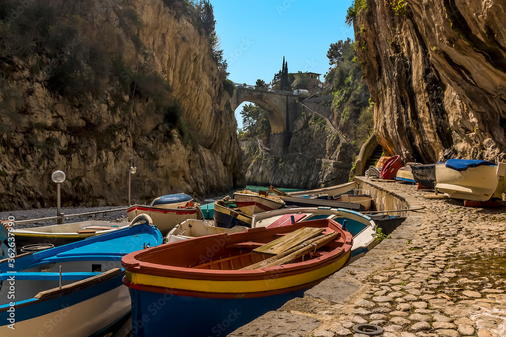 Fishing boats line the quayside in Fiordo di Furore on the Amalfi Coast, Italy