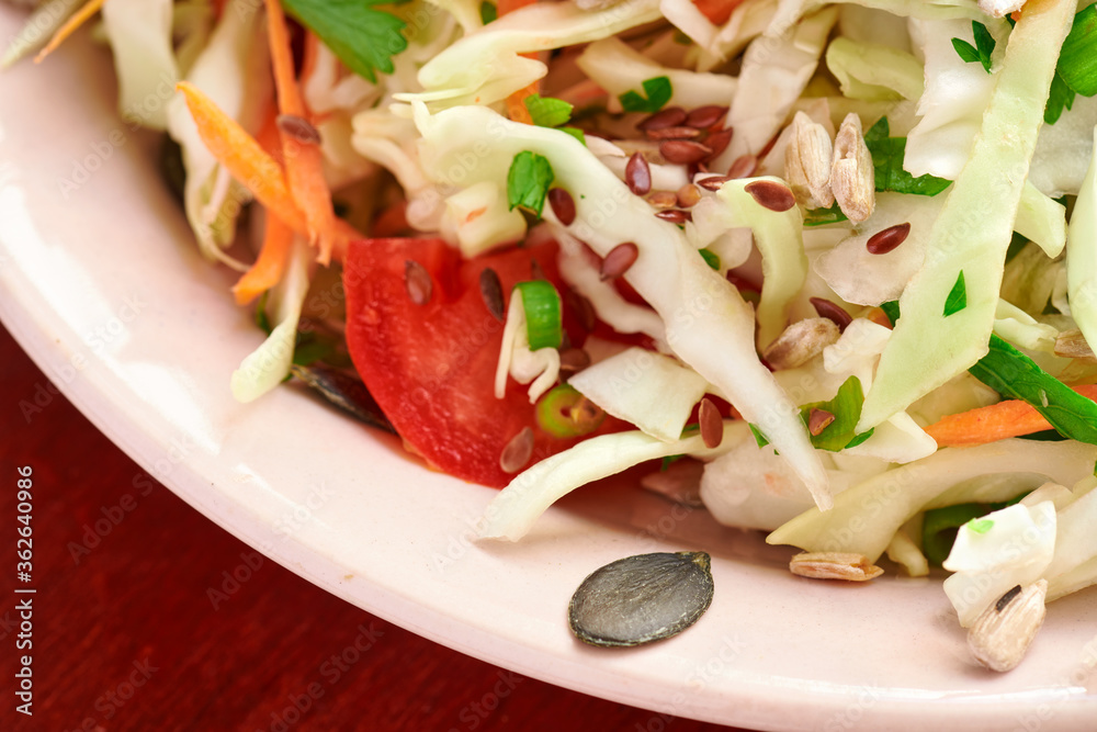 healthy food - fresh chopped vegetables on a wooden background, tomatoes and greens healthy food - fresh chopped vegetables on a wooden background, tomatoes and greens
