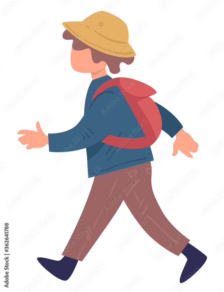 Kid wearing hat and rucksack walking, traveling child Kid wearing hat and rucksack walking, traveling child