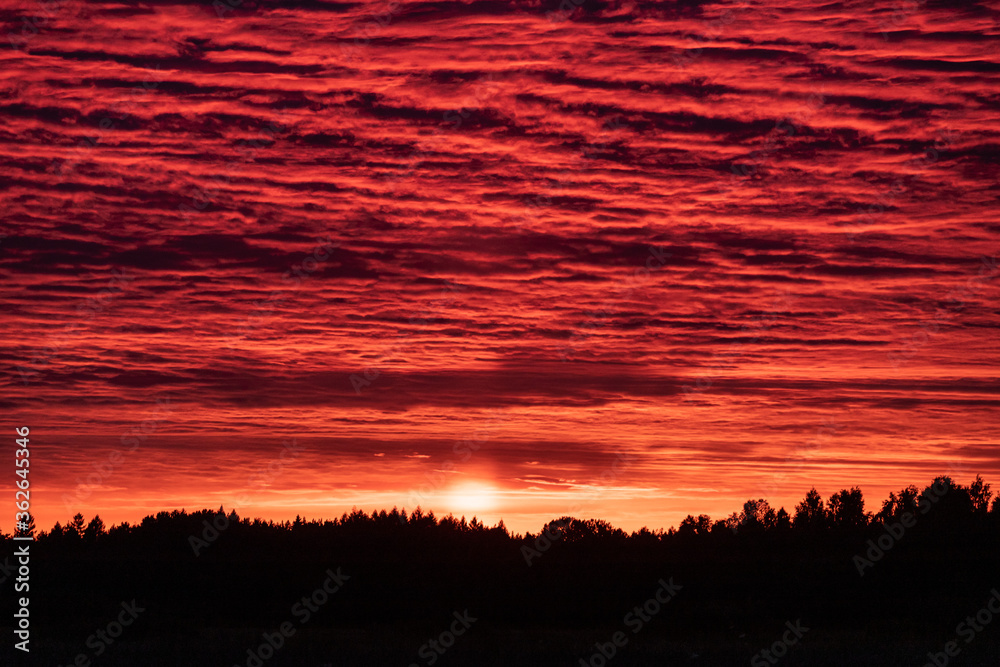 Fototapeta premium Red sunset with storm clouds