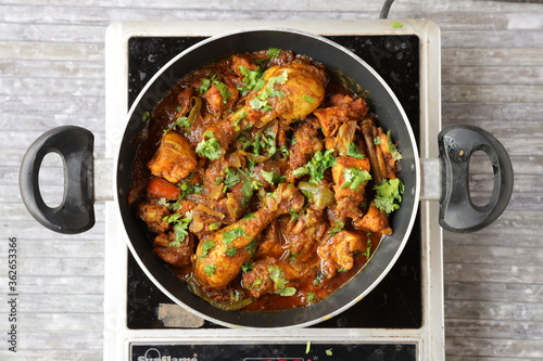 Chicken curry_masala_cooking pan photo