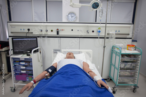 Dummy patient with testing equipment at a clinical skills training centre.
