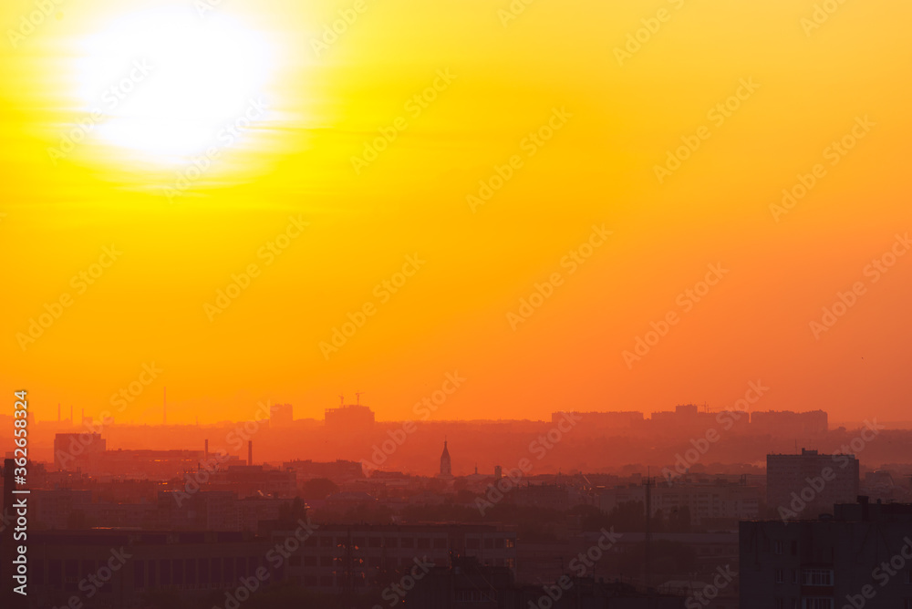 Beautiful orange sunset over the city of Ryazan in summer