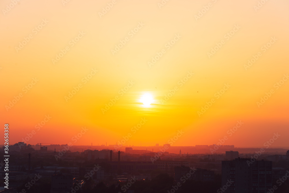 Beautiful orange sunset over the city of Ryazan in summer