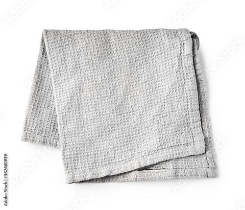Kitchen grey folded table cloth isolated on white background. Top view of napkin.