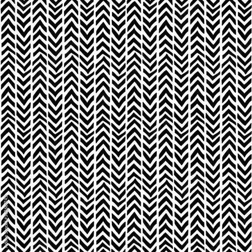 Chevron seamless pattern. Hand-drawn zig zag in black on a mural background. Weaving pattern. Vector illustration for paper, textile and style teenager, teens and children.