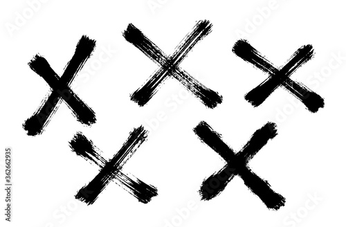 Different cross shapes painted with a brush. Vector illustration