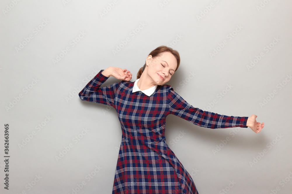 Portrait of happy carefree joyful girl relaxing and being in good mood Portrait of happy carefree joyful girl relaxing and being in good mood