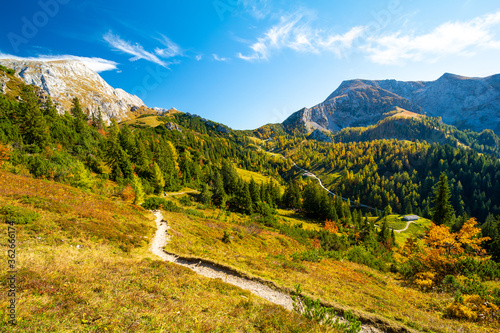 trail in bavarian Alps mountain in Berchtesgaden during sunny day in autumn in Germany photo