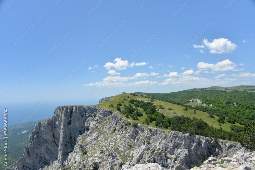 on a high mountain you can see the entire beach and coast during the day in summer on a high mountain you can see the entire beach and coast during the day in summer