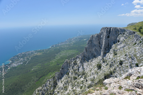on a high mountain you can see the entire beach and coast during the day in summer © MOZHINA