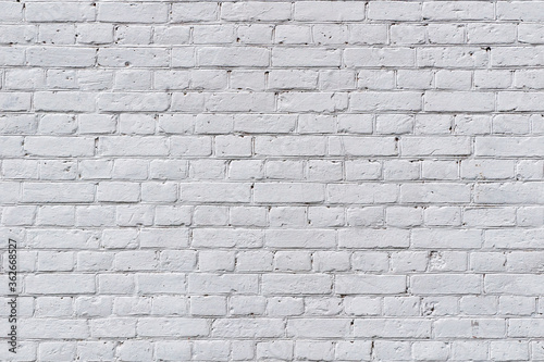 Full frame image of the weathered painted white brick wall. High resolution seamless texture of the old brickwork for 3d model, background, wallpaper, poster or collage