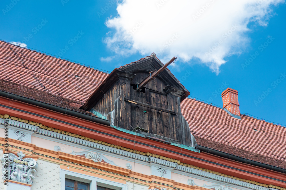 Roof and wooden hook on it in Poland