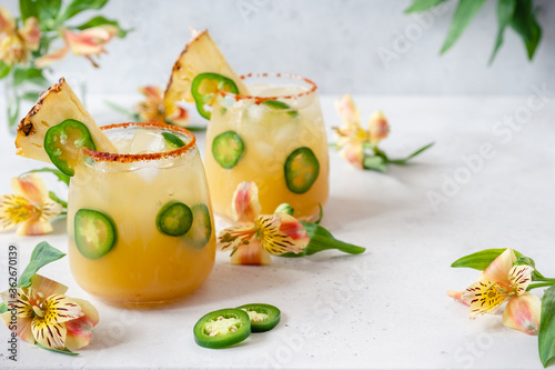 Принти на полотні Fresh spicy pineapple jalapeno margarita alcoholic cocktail