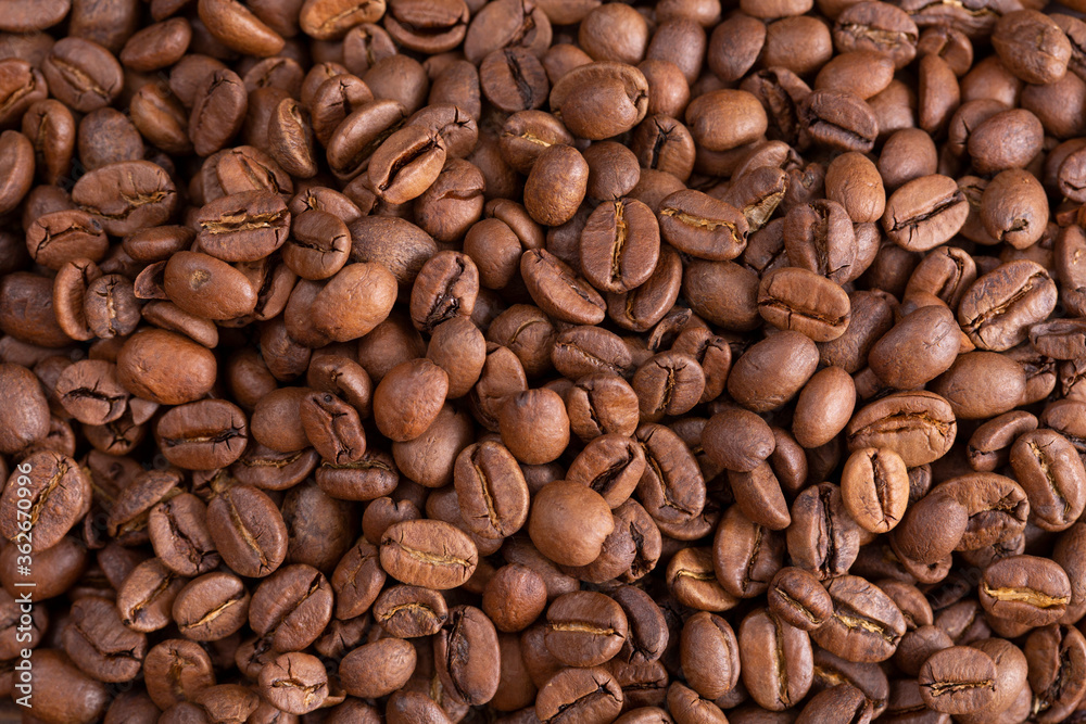 Roasted coffee beans closeup. background. Copy space Roasted coffee beans closeup. background. Copy space