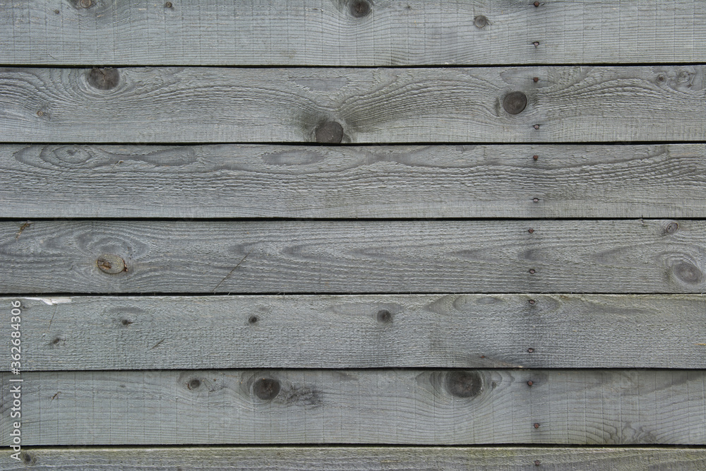 Obraz premium The texture of the old gray cracked Board