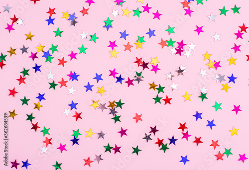  Pink background decorated with stars, christmas background, paper for a present