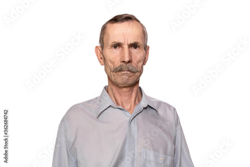 Photography Portrait of angry senior mustachioed man isolated on white background