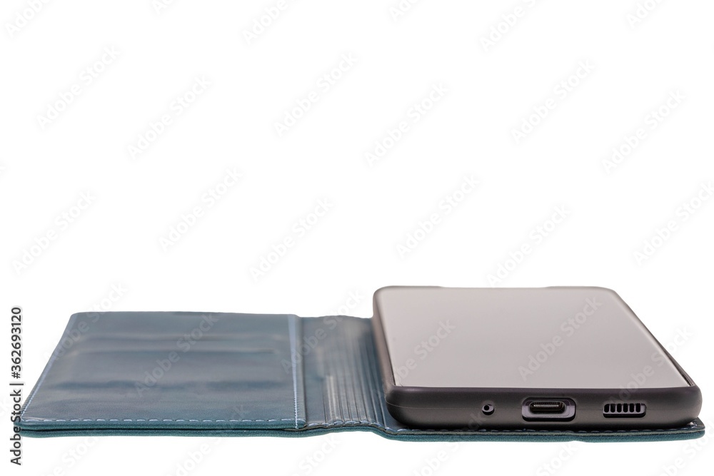 Close up view of mobile phone in green case isolated on white background. Communication concept. Close up view of mobile phone in green case isolated on white background. Communication concept.