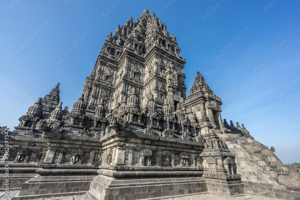 Side view of Candi Siwa (Shiva Temple) in Prambanan temple complex. 9th century Hindu temple compound located near Yogyakarta on Central Java, Indonesia