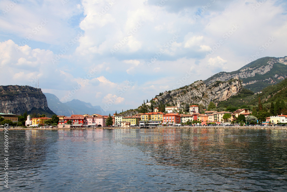 Lake Garda, in northern Italy surrounded by hills and villages with boats in the water