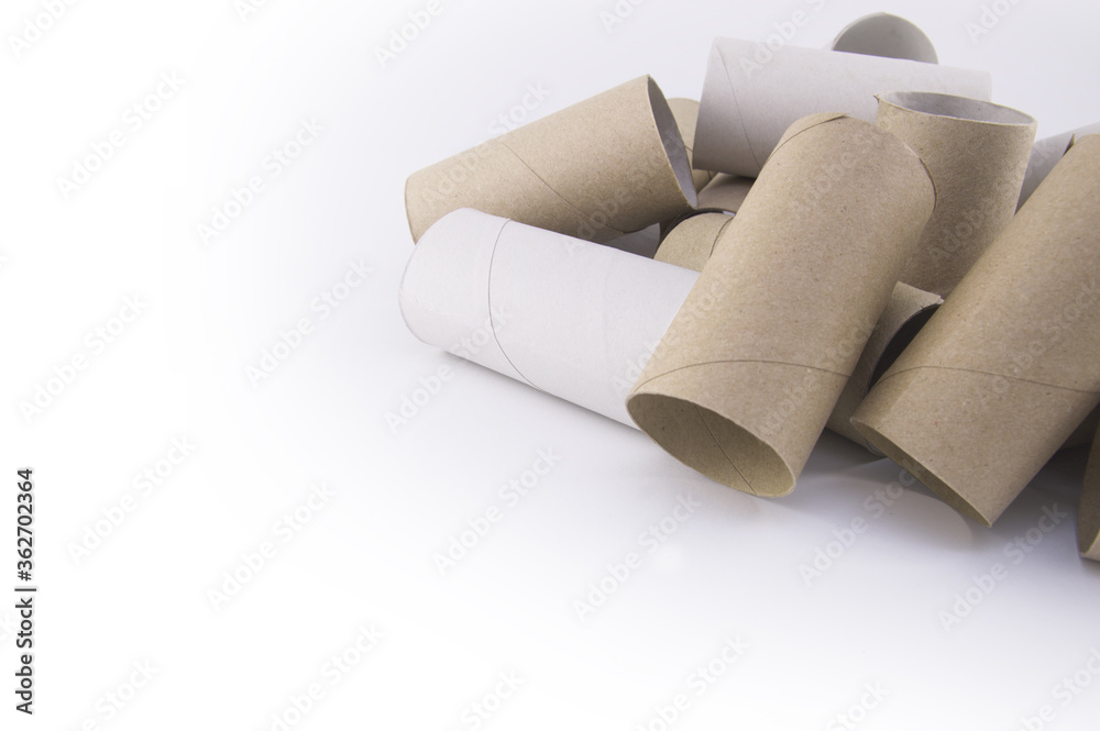 Fototapeta premium toilet paper bushings lie on a white background on isolate