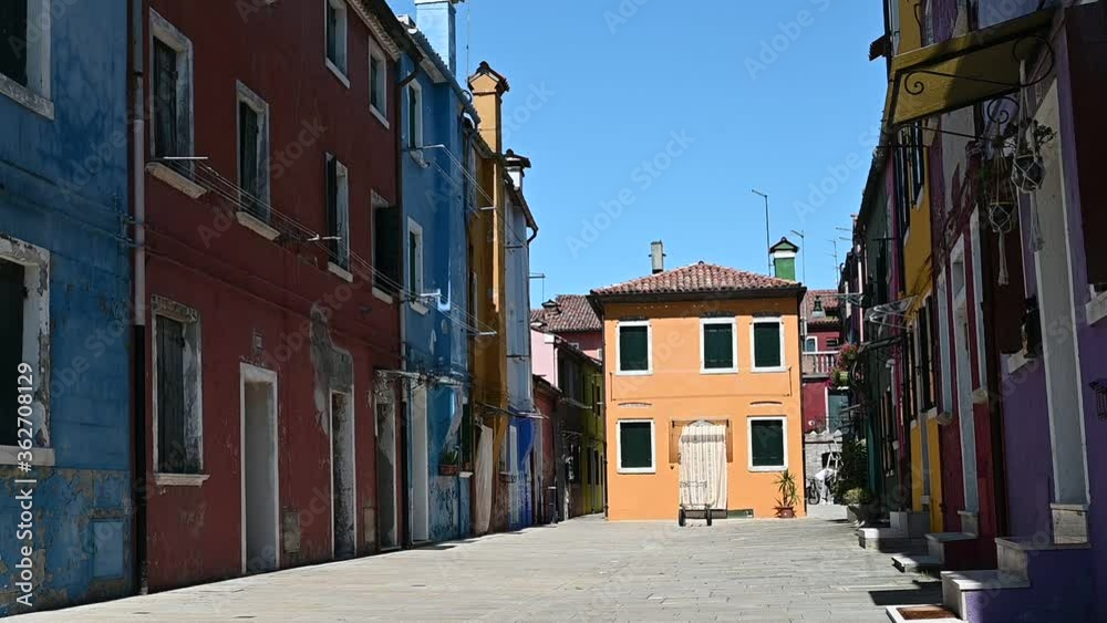 Burano, Venice - Colorful buildings between the canals of the lagoon city Burano, Venice - Colorful buildings between the canals of the lagoon city