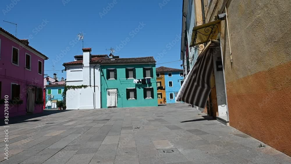 Burano, Venice - Colorful buildings between the canals of the lagoon city Burano, Venice - Colorful buildings between the canals of the lagoon city