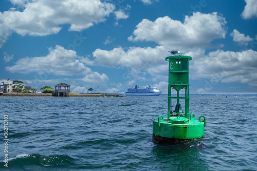 Green Channel Marker and Cruise Ship in Background