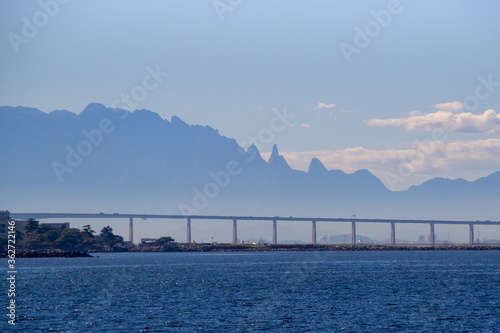 rio x niteroi bridge, with the bottom of the mountain ( Serra dos Orgaos ) range the main link between the cities of Rio de Janeiro and Niteroi. photo