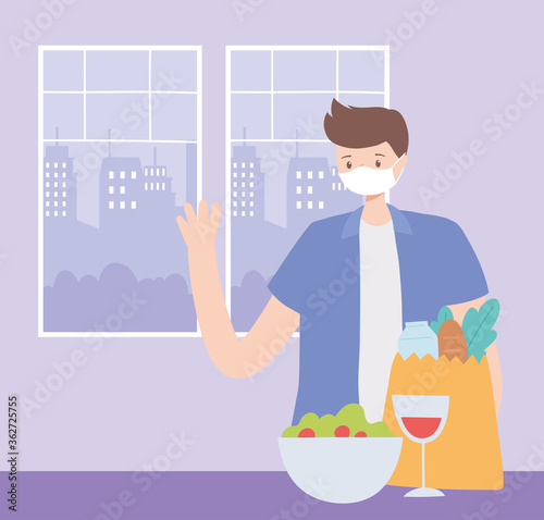man in the restaurant alone because of social distancing restrictions, covid 19 pandemic, prevention of coronavirus infection