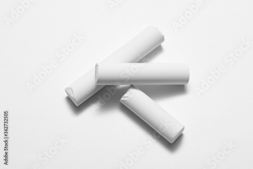 Fotografia White chalk isolated on a white background