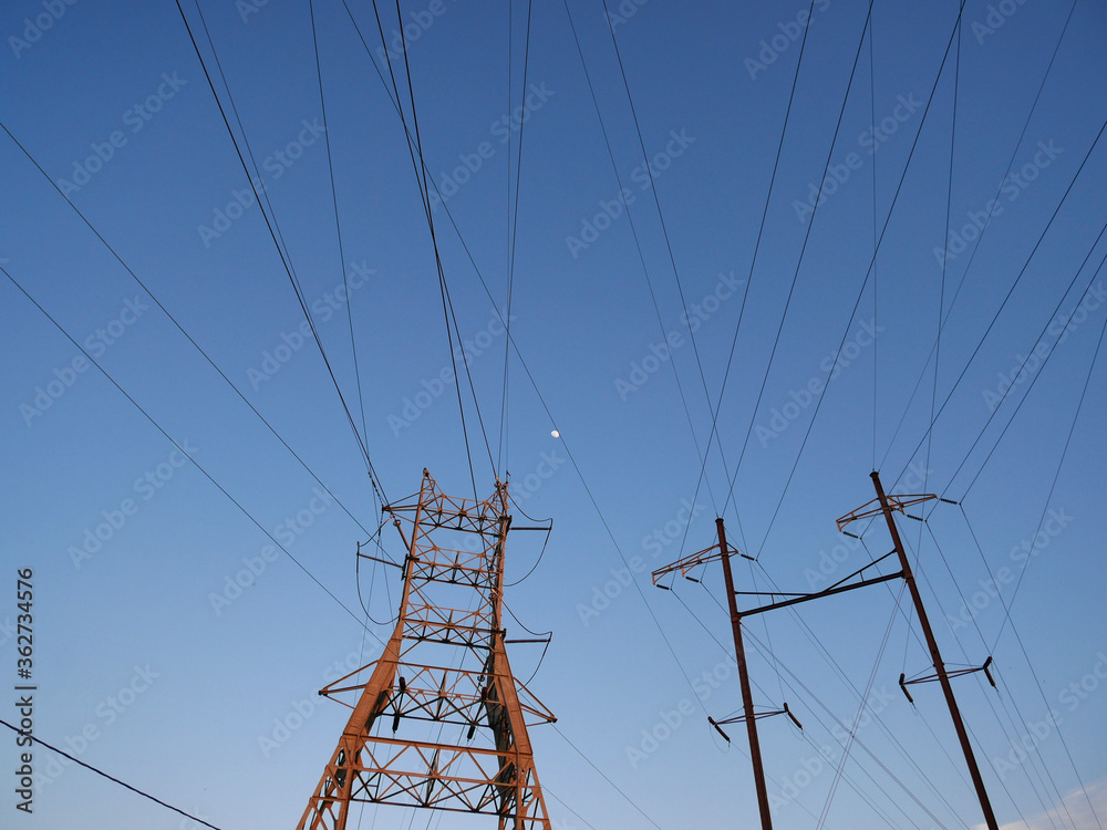 power lines on the blue sky