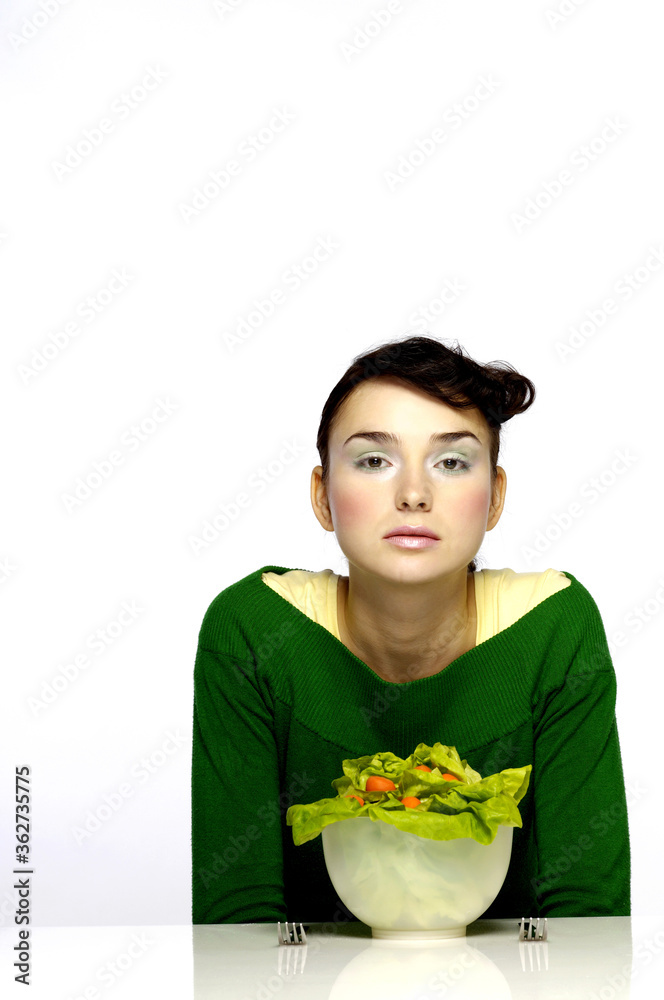 Woman preparing to eat a bowl of salad Woman preparing to eat a bowl of salad