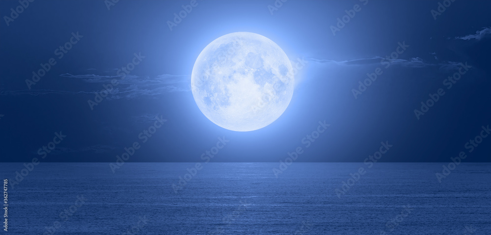 Fototapeta premium Night sky with moon in the clouds 